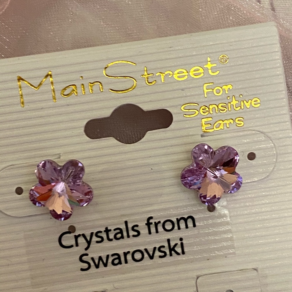 Purple flower shaped earrings